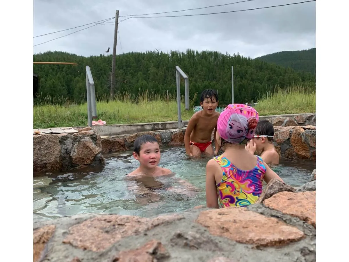 A relaxing hot spring is the perfect escape after a long day of riding